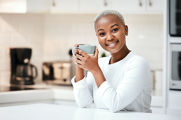 Image showing Black woman in kitchen, coffee and portrait, relax at home and morning routine with warm caffeine beverage. Female person holding mug, smile and happy in apartment with espresso and positivity