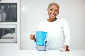 Image showing Water, filter and pitcher for woman in kitchen to refresh with glass of liquid hydration. Portrait, happy black female person or jug of pure aqua beverage for drinking cold or clean nutrition at home