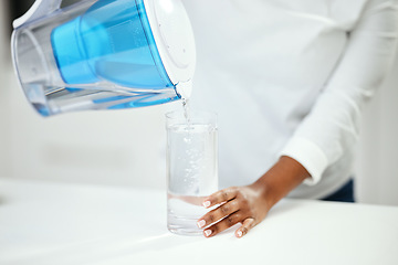 Image showing Hands, person and pitcher of filter water, glass and liquid hydration for purification at home. Closeup, thirsty woman and pouring healthy aqua beverage for nutrition, drinking and clean filtration