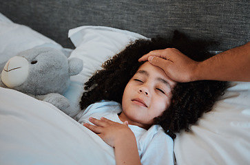 Image showing Sick, fever and kid sleeping in bed for rest to recover from flu, cold or allergies at her home. Illness, tired and hand of father checking temperature of his daughter in her bedroom at their house.