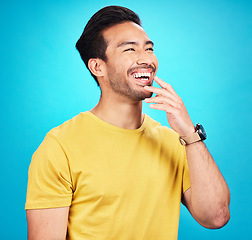 Image showing Man, laughing and thinking of funny idea for comedy, joke or humor and happiness as inspiration for meme, comic or promotion. Person, laugh and happy face for crazy, silly or fun advertising mockup