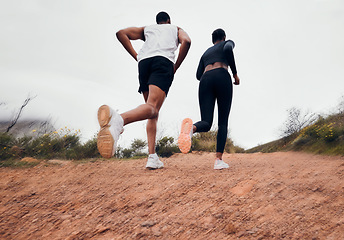 Image showing Running couple, dirt path and fitness with workout and training on a race and marathon. Runner, young people back and road on a exercise challenge outdoor with sport cardio performance in nature