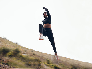 Image showing Fitness, running and fast with black woman in nature for health, workout and challenge. Performance, sports and exercise with female runner training in outdoor for speed, marathon and wellness