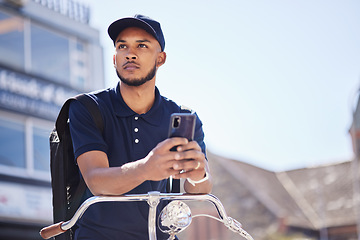 Image showing City man, cellphone or thinking about travel journey, bicycle route or sustainable transport on morning commute. Carbon neutral bike, gps smartphone app or planning male student looking at direction