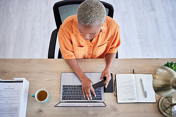 Image showing Office, laptop or black woman with credit card for financial payment, budget savings or investment growth. Administration, top view or writer typing banking info on app or fintech website online