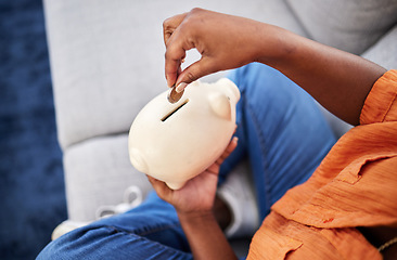 Image showing Woman, hands and coins in piggy bank for savings, finance or money investment on sofa at home. Hand of female person with piggybank for financial freedom, cash growth or budget planning at the house