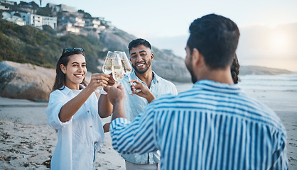 Image showing Smile, friends and toast with champagne on beach, having fun and bonding at sunset. Ocean, group and people cheers with wine glass, alcohol and drink for celebration on holiday, summer party and sea.