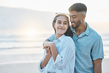 Image showing Couple, hug on beach and love, travel and holiday with mockup space and happiness together outdoor. Summer, support and care with affection, man and woman in nature with adventure by the ocean