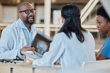 Image showing Black man, doctors and meeting with xray of test results, analysis and healthcare feedback. Medical surgeon, nursing team and planning radiology assessment for x ray chart, clinic report and review