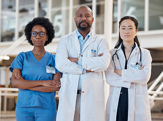 Image showing Portrait, serious and team of doctors with arms crossed in hospital, healthcare support and clinic services. Diversity, group and confident medical employees ready for surgery collaboration together