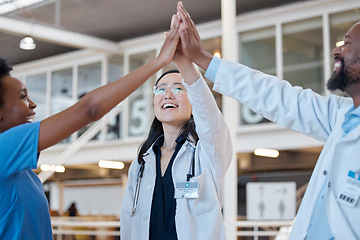 Image showing High five, doctors and smile for success, team unity and celebrate medical goals in clinic. Healthcare, happy group and people join hands for celebration, motivation and collaboration of diversity