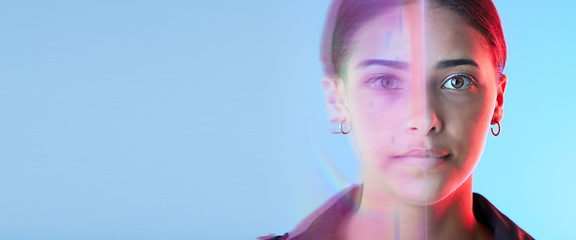 Image showing Face overlay, futuristic and woman on studio blue background for cyberpunk, digital world and biometric. Facial identity, neon lights and young gen z person in portrait for future technology banner