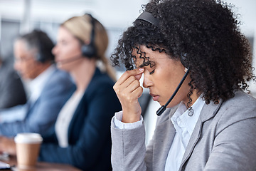 Image showing Headache, tired or woman in call center with burnout, head pain or overworked in crm communication. Migraine, office or stressed telemarketing sales agent frustrated with anxiety, fatigue or problem