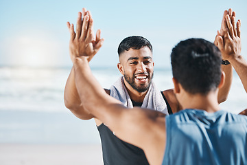 Image showing High five, training success and people at beach celebration, winning and workout goals or teamwork. Fitness, exercise and sports men, personal trainer or athlete friends, hands together and support