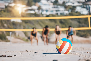 Image showing Ball, beach and volleyball sports with people together for fitness challenge or competition. Young men and women or athletes ready for exercise, workout or fun game outdoor in nature, sea or sand