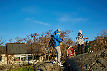 Image showing mother and little daughter travel in mountains