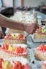 Image showing Manual cakes production