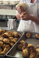 Image showing Unsanitary production of cookies