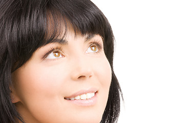 Image showing happy woman looking up