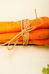 Image showing baby carrots bunch tied with rope