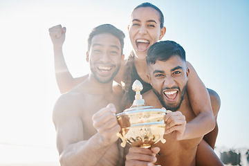 Image showing Winning, portrait and volleyball team on the beach with a trophy for goals, success or achievement. Happy, celebrate and group of athletes in unity together by ocean or sea on a summer weekend trip.