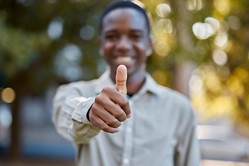 Image showing Black man, hands and thumbs up in park for good job, approval or success in the nature outdoors. Portrait of happy African male person show thumb emoji, yes sign or like for agreement or deal outside