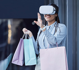 Image showing VR, glasses and woman in online shopping, e commerce and fintech on high tech, futuristic or metaverse. Virtual reality of young customer or person with fashion bag in AR or 3d vision of digital mall