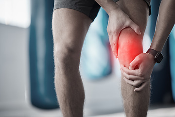 Image showing Fitness, closeup and man with a knee injury, accident or pain after a exercise in the gym. Sports, medical emergency and zoom of a male athlete with bruise or sprain leg muscle or bone after workout.