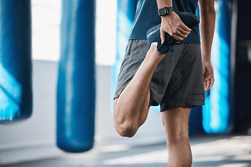 Image showing Back, fitness and stretching with a sports man in the gym getting ready for a workout or training routine. Exercise, health and warm up with a male athlete in preparation of a workout for wellness