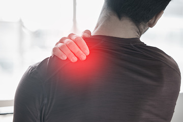 Image showing Hand, back pain and injury with the shoulder of a man in red highlight during a fitness workout. Healthcare, anatomy and emergency with a male athlete holding a joint after an accident in the gym