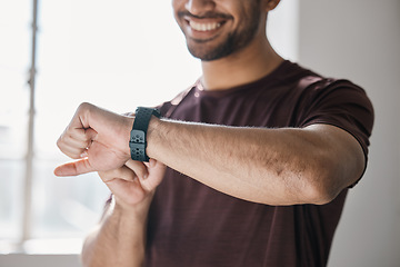 Image showing Athlete, fitness and smart watch with app to check, measure or time exercise for tracking health on technology. Sports, man and happy with workout, training and cardio wellness in gym facility