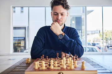 Image showing Chess, man and thinking of strategy in game, problem solving or person playing on chessboard in competition. Planning, choice and focus on challenge or king, queen and player with decision to move