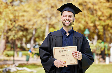 Image showing Graduate, guy and certificate with portrait in outdoor with success for education or scholarship. Achievement, male student and diploma with motivation or degree in information technology at college.