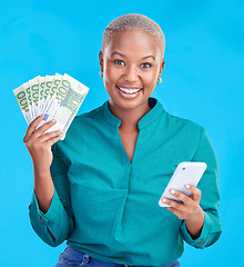 Image showing Cash, phone and woman in portrait for winning, finance or online savings, profit or cash prize. Success, lottery and winner or african person on mobile, money fan or banking on studio blue background