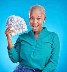 Image showing Woman, wow portrait and money fan for bonus, financial success and winning, finance loan or cashback bonus. African person or winner surprise for notes or cash profit on a studio, blue background