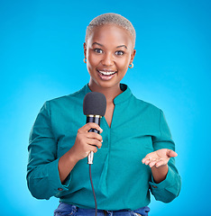 Image showing Woman, microphone and studio portrait for interview, news program or questions for talk show by blue background. Young African reporter, journalist or happy tv host with holding mic, speech and press