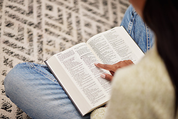 Image showing Closeup, hands and woman with a bible, spiritual and religion for peace, guidance and learning. Zoom, female person or worship with praise, reading scripture and gratitude with prayer, home and relax