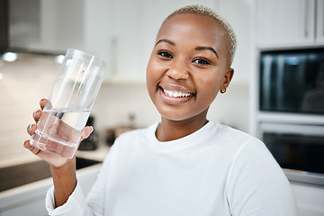 Image showing Portrait, glass and black woman drinking water, wellness and health with nutrition, funny or happiness. Face, female person or girl in her kitchen, liquid for energy or home with aqua, detox or smile