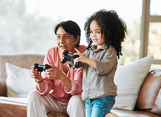 Image showing Grandmother, kid and gaming on sofa, controller and happy together with bond, care and love in family home. Senior woman, young child and playing with video game, esports and excited in living room