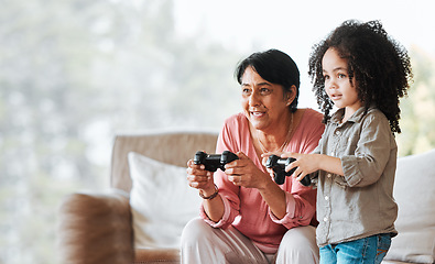 Image showing Grandma, child and gaming in home, controller and happy together with bonding, competition and love in lounge. Senior woman, young kid and playing with video game, esports and mockup in family house