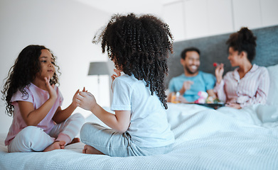 Image showing Happy, breakfast and relax with family in bedroom for morning, love and care. Happiness, support and free time with parents and children in bed at home for wake up, bonding and peace together