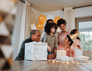 Image showing Grandparents, parents and children with cake at birthday for event, celebration and social gathering. Happy family, surprise and kids with mom and dad for dessert, snacks and gifts in living room