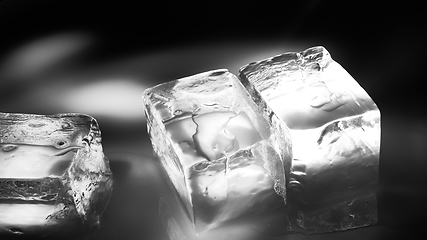 Image showing Pieces of crushed ice cubes on black background.