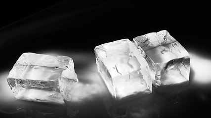 Image showing Pieces of crushed ice cubes on black background.