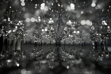 Image showing A lot of wine glasses in a row