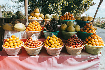 Image showing tropical fruits in baskets on fruit market