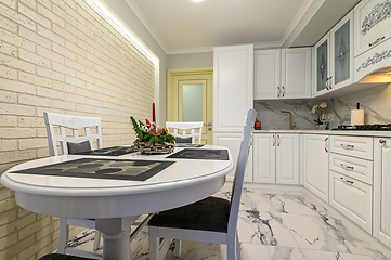 Image showing White kitchen in classic style just before the Christmas