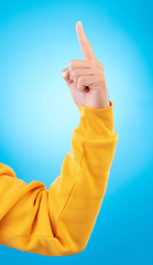 Image showing Man, hands and pointing up finger for idea, solution or remember in memory against a blue studio background. Hand of male person in choice, decision or advertising plan guide, offer or opportunity