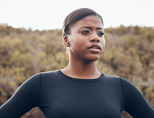 Image showing Fitness, black woman and workout in nature forest for health wellness. Training or exercise, motivation or breathing and serious female athlete in sportswear for marathon practice in woods thinking