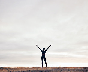 Image showing Fitness, hands in air and back of woman with achievement, success and workout goals in nature. Sports, mockup space and happy female person with celebration for exercise, training and running target